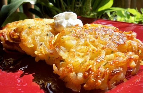 Preparing traditional potato pancakes can be a time consuming process....so youll really relish this recipe.  Thats because theres no need to grate potatoes.  By using frozen hash browns(or even quicker to use refrigerated shredded hash browns), these spud-tacular palate-pleasing pancakes are ready in a hurry!  Recipe from TOH.  I sometimes add some cheddar cheese in with the mixture. Tater Tots, Potato Pancakes, Hash Brown, Hash Browns, Snow Cones, Cracker Barrel, Potato Dishes, Breakfast Foods, Veggie Sides