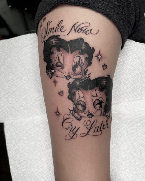 Clown Betty Boop Tattoo, Matching Betty Boop Tattoos, Betty Boop Smile Now Cry Later, Chicana Tattoo Ideas, Oldies Tattoo Ideas, Tattoo Dedicated To Parents, Pretty Tattoos For Women Arm, Tiny Betty Boop Tattoo, Cartoon Tattoos Women