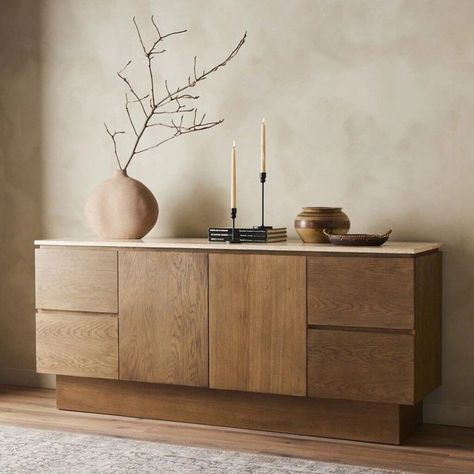 Sideboards are a versatile and functional piece of furniture that can add both style and storage to any room. Typically placed in dining rooms, living rooms, or kitchens, sideboards are used to store dishes, flatware, and other dining essentials. However, they can also be used in bedrooms, entryways, or home offices for additional storage and … Dining Room Credenza, Travertine Colors, Sideboard Styles, Sideboard Decor, Dining Room Buffet, Bedroom Sideboard, Sideboard Designs, Kitchen Table Settings, Home Offices