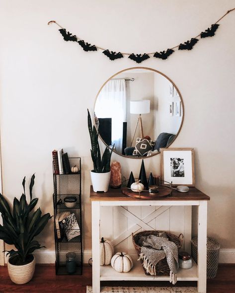 Lauren Tapley on Instagram: “I would like to describe our house as “touched lightly by witchy tones... with a hint of spook” 🦇  Believe me, I love black candles, dark…” Decorating Entryway, I Love Black, Candles Dark, Witch House, Entryway Table, Love Black, Black Candles, Believe Me, Our House