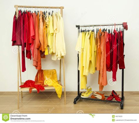 Shades of yellow, orange and red clothes hanging on a rack nicely arranged. Monochromatic Fashion, Yellow Clothes, Monochromatic Outfit, Orange Outfit, Coordinating Outfits, Plastic Hangers, Yellow Outfit, Find Color, Red Outfit