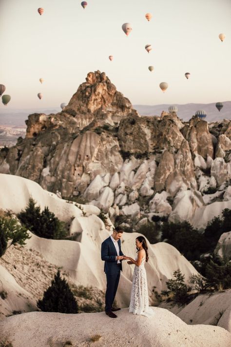 This vow exchange at the Turkey hot air balloon festival gives new meaning to an 'epic elopement!' With a camel ride through the city.