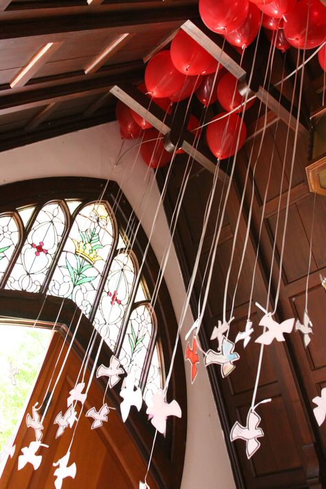 Pentecost, The Holy Spirit Descended like a Dove.  Cut out on cardstock, doves, decorated by the Sunday School, with handwritten scriptural verses by the adults, attached to helium balloons (red), symbolic of the tongues of fire that were on each of the believers.  These are waiting in the narthex entryway on Pentecost Sunday, and after the service, one is taken by each member, and released outside, symbolic of the releasing of the Holy Spirit in our own lives. Pentecost Decorations, Pentecost Craft, Tongues Of Fire, Fire Theme, Pentecost Sunday, Confirmation Party, Church Banner, Prayer Stations, Church Altar