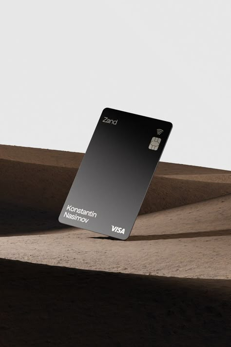 3D render of Zand Bank card with a sleek and minimal black design, placed on a textured surface. Bank Cards Aesthetic, Credit Card Photography, Bank Card Aesthetic, Credit Card Design Ideas, Banking Aesthetic, Aesthetic Credit Card, Credit Card Aesthetic, Credit Card Ads, Bank Card Design