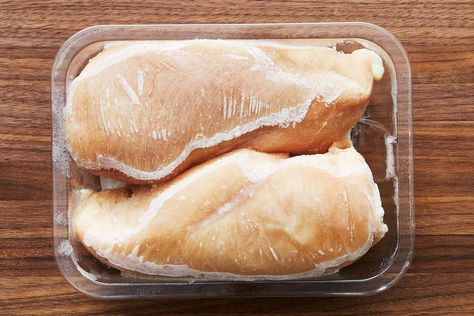 Read on to find out the right ways to safely thaw frozen chicken. Use water, the microwave, or time to defrost chicken. Just don't use the counter. Thawing Chicken, Defrost Chicken, Microwave Baking, Cooking Frozen Chicken, Frozen Turkey, Frozen Meat, Stuffed Whole Chicken, Fresh Meat, Frozen Chicken