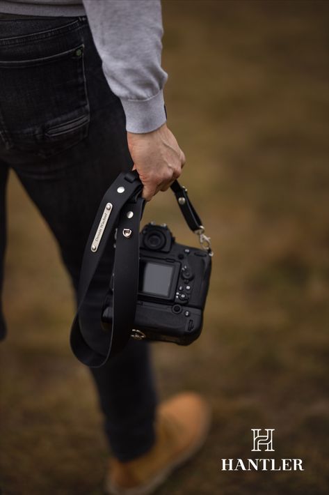 CAMERA NECK STRAP | CLASSIC BLACK A custom-made handcrafted leather camera neck strap in Classic Black. Your (business) name can be engraved on the metal name tag which is attached to the camera neck strap. It’s a durable and stylish camera strap suitable for every photographer with a DSLR and/or SLR camera. • Easy to install and adjustable to every fit • Suitable for almost every camera model • Made from vegetable tanned high quality leather • Engraving can be up to 15 characters • 8 colors. Metal Name Tags, Camera Neck Strap, Leather Engraving, Metal Tag, Metal Tags, Camera Strap, Slr Camera, Handcrafted Leather, Neck Strap