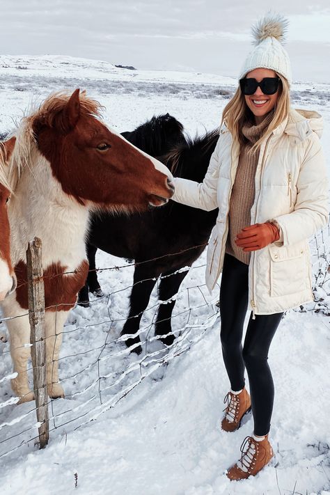 Fashion Jackson Wearing White Puffer Coat Winter Boots Iceland Horses Iceland Travel Guide Iceland Fashion, White Puffer Coat, Winter Vacation Outfits, Iceland Trip, Mountain Outfit, White Puffer, Snow Outfit, Fashion Jackson, Zooey Deschanel