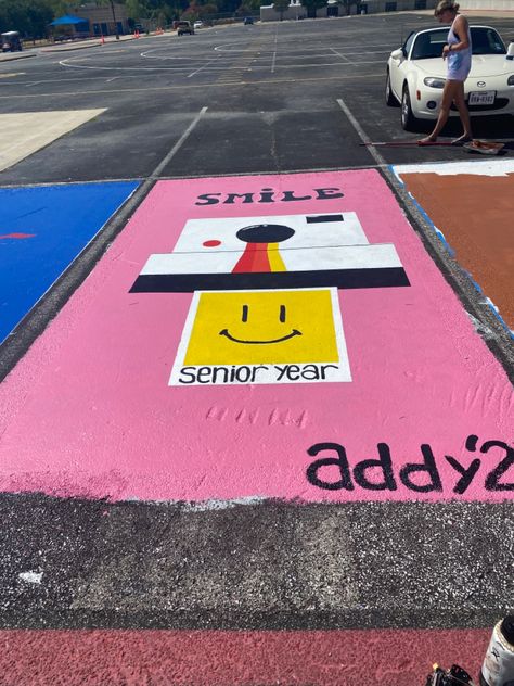 Senior Parking Spaces Camera, Spotify Senior Parking Spot, Floral Senior Parking Spot Painting, Best Friend Matching Senior Parking Spots, How To Paint Senior Parking Space, Mamma Mia Parking Spot, Painted Parking Spots Senior Easy, Pink Parking Spot, Pink Senior Parking Spots