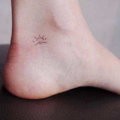 15 Beach-themed tattoos to get to feel like you're on holiday Sun And Wave Tattoo, Tiny Sun Tattoo, Beach Theme Tattoos, Tattoo Sonne, Simple Tattoos For Women, Small Tats, Wave Tattoo, Tattoo Zeichnungen, Theme Tattoo