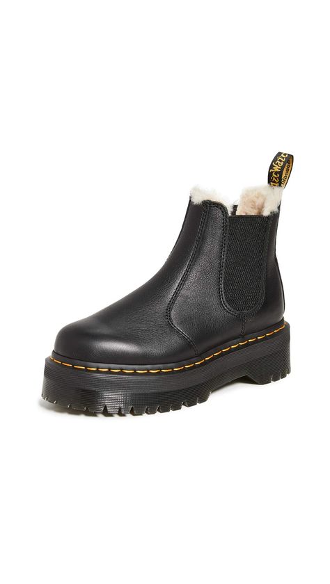 PRICES MAY VARY. Slip-resistant PVC AirWair sole, Platform profile and welt stitching, Faux fur lining Platform: 1.75in / 45mm Dress Stay cozy in these Dr. Martens boots. Featuring a classic chelsea silhouette and the brand's signature stitching, this warm, faux-fur-lined pair will keep your feet nice and toasty. Dr Martens 2976 Quad, Fall Boot Trend, Dr Martens Platform, Dr Martens 2976, Dr Martens Womens, Trending Boots, Martens Shoes, Boots Fall, Crazy Horse