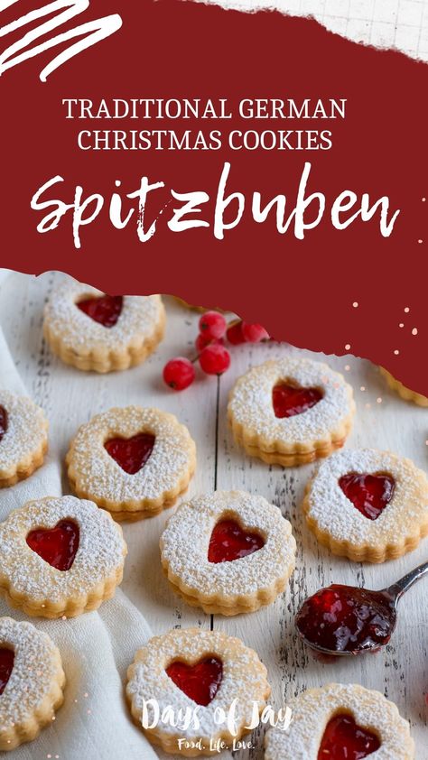 One of the most beautiful traditional German Christmas cookies recipes is Spitzbuben. Also known as Linzer Augen or Linzer Cookies, the delicious combination of buttery short pastry and tangy redcurrant jelly is a Christmas classic. German Linzer Cookies, Beautiful Pastries Recipes, Croatian Cookies Christmas, German Linzer Cookies Recipe, German Sweets Recipes, German Biscuits Recipes, Jelly Christmas Cookies, German Baking Recipes, Traditional German Christmas Cookies