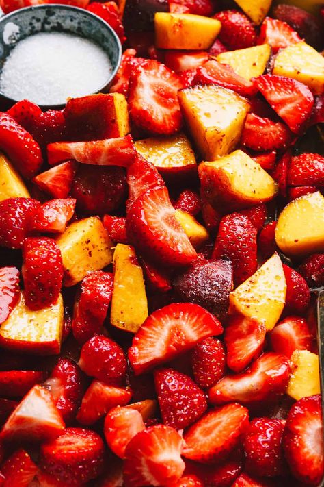 A close-up image of a tray of the sweet & sour Tajín peaches and strawberries. my Sweet & Sour Tajín Peaches & Strawberries may just be my favorite way to eat them yet. They are a little sweet, a little salty, and a little spicy, for a flavor that truly cannot be beat! Tajin Strawberries, Peaches And Strawberries, Clean Eating Dessert Recipes, Gluten Free Desserts Healthy, Quick Smoothies, Chili Lime Seasoning, Dairy Free Cookies, Sour Fruit, Delicious Clean Eating