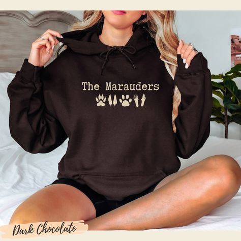 Marauders Hoodie, The Marauders sweatshirt, Bookish Booktok merch Wizard World fandom sweater Marauders bookish Hoodie is a perfect addition to any wardrobe and a cool bookish gift idea. A cute bookish hoodie will be an amazing gift for every friend or family member. A unisex heavy blend hooded sweatshirt is relaxation itself. The material is a thick blend of cotton and polyester. This makes for a plush, soft feel alongside warmth. It's also a great surface for printing. There are no side seams. Marauders Sweatshirt, Bookish Hoodie, Booktok Merch, Harry Potter Items, Harry Potter Outfits, Clothing Design Sketches, My Shopping List, Book Clothes, Funny Outfits