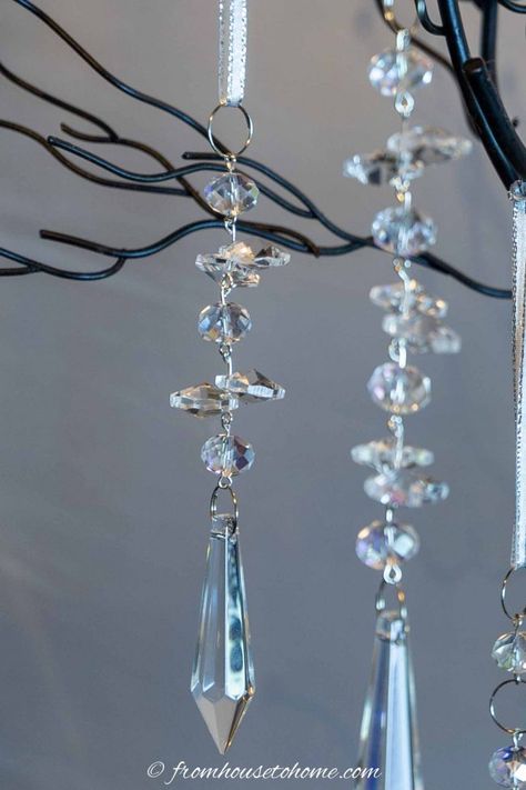 These crystal DIY Christmas ornaments are a beautiful way to add some sparkle to your Christmas tree decorations. They're easy to make and look beautiful on a flocked Christmas tree. Diy Beaded Christmas Ornaments, Chandelier Crystals Repurposed, Crystal Ornaments Diy, Crystal Installation, Hanging Crystals Diy, Repurposed Chandelier, Crystal Christmas Ornaments, Chandelier Necklace, Beaded Christmas Decorations