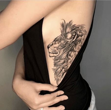 100 Best Tattoo Ideas For Women To Help You Find The Perfect Tat (And Their Meanings)    #tattoosforgirls  #tattoo #tattoos #tattooideas #tattooideasforgirls #tattooideasforwomen  #womantattoo #womentattoos #womanwithtattoo #smalltattoos #tattoomeaning  #boobtattoo #cooltattoo #herway Model Tattoos, Tier Tattoo, Epic Tattoo, Leo Tattoos, Inspiration Tattoos, Side Tattoos, Badass Tattoos, Tattoo Feminina, Rib Tattoo