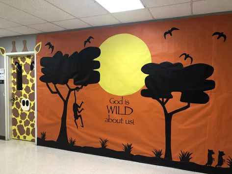 VBS into the wild wall and door Jungle Animals Preschool, Safari Theme Classroom, African Safari Theme, Jungle Crafts, Vacation Bible School Themes, Cardboard Animals, Giraffe Birthday, Paper Mache Animals, Vbs Themes