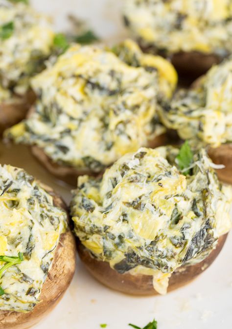 Spinach Artichoke Dip Stuffed Mushrooms, Spinach Artichoke Mushrooms, Mushroom Spinach Appetizers, Spinach Artichoke Stuffed Mushrooms, Artichoke Stuffed Mushrooms, Keto Stuffed Mushrooms, Artichoke And Spinach Dip, Baked Stuffed Mushrooms, Artichoke And Spinach