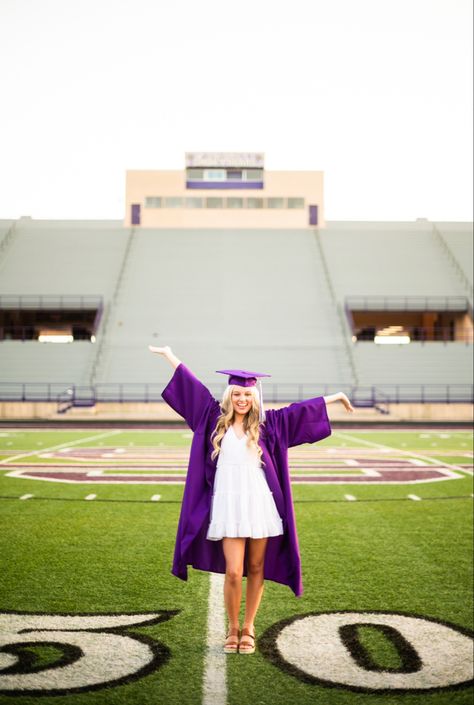 Unique Cap And Gown Senior Pictures, Senior Girl Photoshoots Cap And Gown, Kindergarten Senior Pictures, Cape And Gown Senior Pictures, Cap And Gown Senior Pictures Football Field, Creative Cap And Gown Pictures, Kindergarten And Senior Picture Ideas, Football Field Graduation Pictures, Cap And Gown Portraits