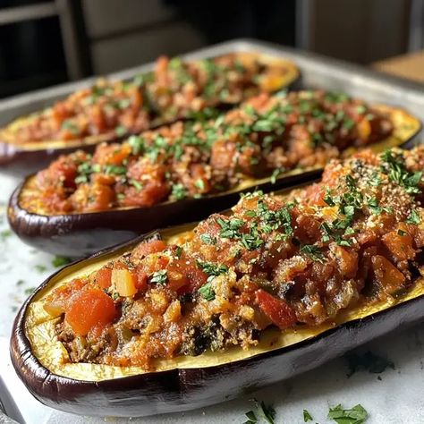 Stuffed Eggplant: Hearty and Satisfying - Recipes Time Eggplant Stuffed Peppers, Italian Stuffed Eggplant, Stuff Eggplant Recipes, Stuffed Eggplant Recipes Vegetarian, Stuffed Eggplant Recipes, Eggplant Recipes Healthy, Satisfying Recipes, Eggplant Rolls, Baby Eggplant