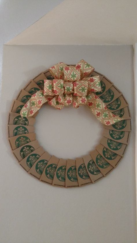 Repurposing Starbucks coffee cup sleeves in a Christmas wreath. Starbucks Holiday Decorations, Starbucks Christmas Decorations, Christmas Coffee Shop Decorations, Coffee Christmas Tree, Starbucks Wreath, Coffee Shop Christmas Decorations Ideas, Coffee Shop Christmas Decor, Starbucks Decorations, Starbucks Decor