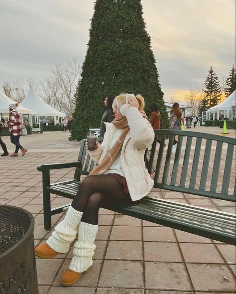 Aesthetic Winter Outfits Canada, Cute Christmas Market Outfit, Cute Winter Outfits Leg Warmers, Winter Outfit Earmuffs, Snow Skirt Outfit, Let Warmers Outfits, Canada Fashion Winter, Timberland Skirt Outfits, Winter Earmuffs Outfit