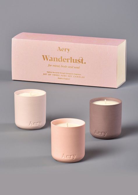 The Wanderlust set from Aery Living's Fernweh collection. These candles are inspired by the intense desire to travel and explore! Let our essential oil transport you to far off destinations. Combinations of fruity musky notes and rich spiced scents. Designed to fill your home with a long-lasting fragrance. Hand-poured into matte porcelain clay pots that are perfect for re-use. Why not use yours to grow indoor plants? This gift set includes three fragrances. Moroccan Rose - Rose, Bergamot and Pep Moroccan Rose, Decorative Candles, Three Candles, Soy Candle Making, Scented Candles Luxury, Candle Store, Candle Packaging, Gold Candles, Fragrance Set