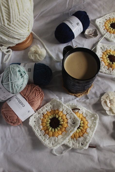 aesthetic photo of crochet granny squares, pink, blue, and white yarn, white flowers, and a cup of coffee on a white sheet. Crochet Vision Board Pictures, Crochet Aesthetic Photography, Crochet Instagram Story Ideas, Crochet Vibes Aesthetic, Crochet Social Media Content, Crotecht Aesthetic, Crochet Aesthetic Pictures, Crochet Asthetic Picture, Crochet Photography Ideas