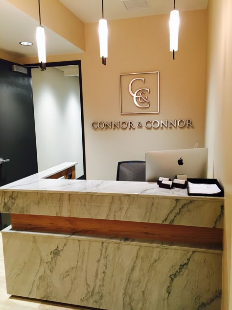 Connor and Connor Law Offices Reception Desk Law Office Reception Desk, Small Law Firm Office Design, Receptionist Area Ideas Offices, Law Office Wall Decor, Law Office Reception Area, Law Firm Reception Area, Office Reception Ideas, Law Firm Reception, Receptionist Counter