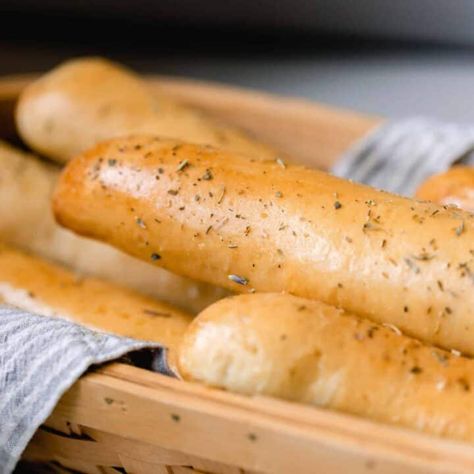 Learn how to make the best sourdough bread sticks with this step-by-step guide! Perfectly fluffy and tender on the inside with a delicious garlic butter on the outside. This easy-to-follow recipe will have your family raving. #farmhouseonboone #sourdoughbreadsticks #breadsticks #sourdough Breadsticks Sourdough, Sourdough Breadsticks Recipe, Sourdough Bread Sticks, Sourdough Breadsticks, Best Sourdough Bread, Italian Bread Sticks, Farmhouse On Boone, Sourdough Rolls, Dough Ideas