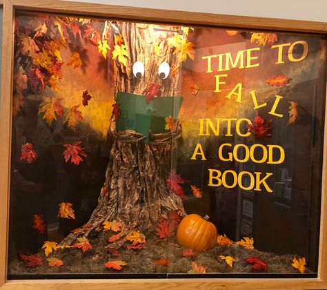 Fall School Display Case Ideas, Fall Display Case Ideas For School, Fall Into A Good Book Display, Fall Library Bulletin Boards Elementary, Fall Library Window Display, Fall Library Displays Bulletin Boards, Elementary School Display Case Ideas, Library Display Case Ideas, Back To School Display Case