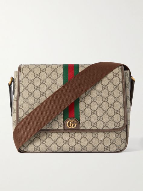 It was while working at the Savoy Hotel that Guccio Gucci got his idea for a line of travel-centric leather goods. A century on, Gucci's bags are just as desirable. The medium-sized 'Ophidia' messenger is ideal for trips into the office. It's made from the label's 'GG Supreme' coated-canvas, with signature webbing and an adjustable shoulder strap. Gucci Bag Men, Messenger Bag For Men, Savoy Hotel, Gucci Collection, Gucci Purse, Gucci Ophidia, Guccio Gucci, Man Purse, Canvas Messenger Bag