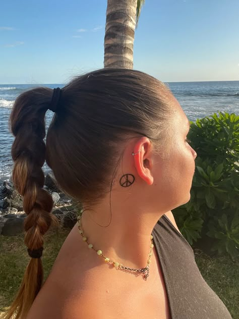 #peace #tattoo #tattooideas Peace Sign Tattoo Behind Ear, Small Peace Sign Tattoo, Peace Tattoos For Women, New Girl Tattoo, Peace And Love Tattoo, Teach Peace Tattoo, Peace Symbol Tattoo, Tranquility Tattoo, Peace Sign Tattoo