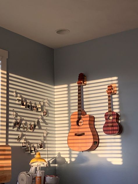 Room With Guitar On Wall, Bedroom With Instruments, Room Decor Guitar, Instrument Room Aesthetic, Guitar Bedroom Aesthetic, Guitar Hanging On Wall, Guitar Decor Ideas, Guitar On Wall, Guitar Room Ideas