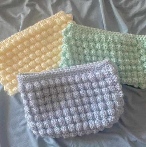 *Please message me with the number of the color for the pouch, and if you would like lining in either plain for floral pattern or no lining at all *Bobble Pouch is about 8in. wide and 5in. tall - Will be made with zipper closure - Will be made with floral or plain lining to match bag color #crochet #bobblestitch #bobblepouch #pencilpouch #makeupbag #pouch Crochet Bobble, Pouch Makeup, Bobble Stitch, Makeup Pouch, Crochet Art, Pencil Pouch, The Pouch, Crochet Clothes, Fiber Art