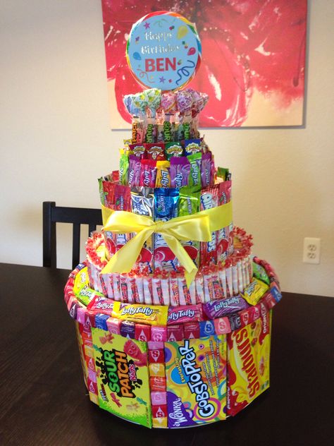 Birthday Gift Display Ideas, Candy Cake Ideas Birthday Diy, Candy Tower Ideas Birthday, Birthday Cake Made Out Of Candy, Snack Gift Basket Ideas Birthday, Diy Candy Birthday Cake, Cake Made Out Of Candy, Snack Birthday Gift Ideas, Diy Candy Cake