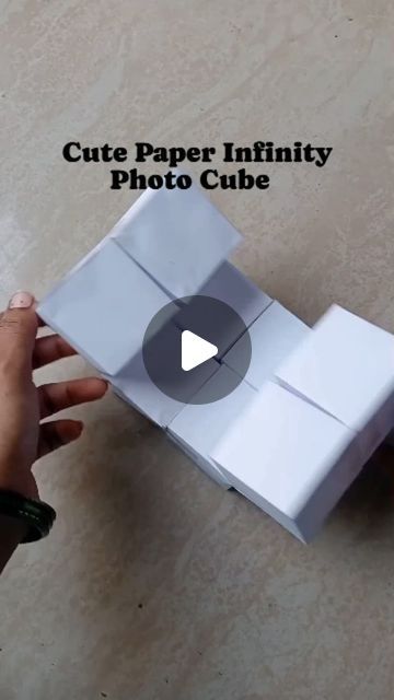 ❣️J@Y@❣️ on Instagram: "Cute Paper Infinity Photo Cube 😱😍 Touch of handmade magic   .  .  .  📌 Follow Me For More:  ➡️ @jayuscorner  ➡️ @jayuscorner  ➡️ @jayuscorner  .  .  .  #CraftedWithLove #Diydecor #Handmadehome #reels #instagram #reelsinstagram #homedecor #papercrafts #Cardbordcreation #homedecorideas #creativecrafting #craftycorner #ecofriendlycrafts #paper #paperflowermagic #DIY #diycrafts #art #artwork #artreels #diybirdbox #giftbox #diyholicolour #organicholicolour #holi #happyholi   #jayuscorner" Photo Cube Diy Paper, Infinity Cube Diy Paper, How To Make Infinity Cube, Infinity Card Ideas, Diy Infinity Cube, Infinity Cube Diy, Paper Set Design, Diy Photo Cube, Infinity Photo