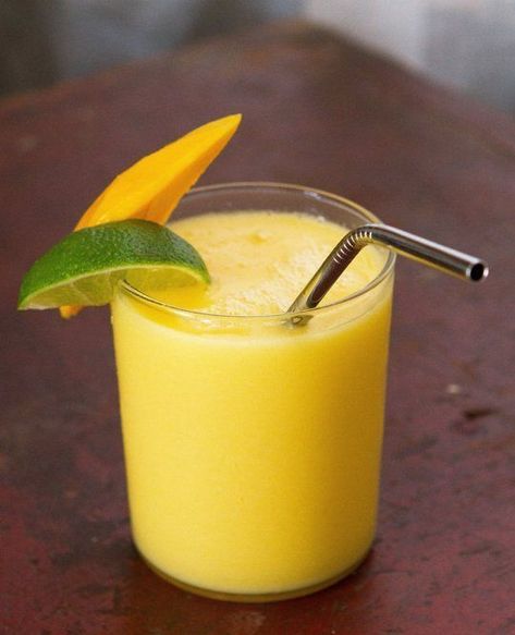 Mango Colada (for all ages) by @TheKitchn thekitchn.com #paleo Mango Colada, Colada Drinks, Recipe Mango, Mango Smoothie Recipes, Vitamix Recipes, Mango Juice, Mango Smoothie, Daiquiri, Smoothie Drinks