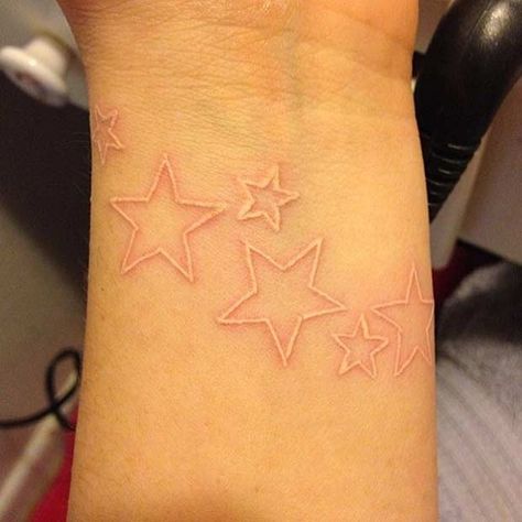 White ink stars White Simple Tattoo, White Ink Micro Tattoo, White Tattoo Ideas Female, White Tattoo Black Skin, White Ink Star Tattoo, White Tatoos Ideas, Tattoo With White Highlights, Tattoo Ideas White Ink, White Tattoos On Black Skin