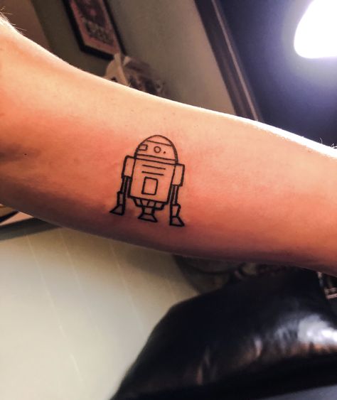 Minimalist R2D2 tattoo R2d2 Tattoo Minimalist, R2 D2 Tattoo, R2d2 Tattoo Simple, R2d2 Tattoo, Lightsaber Tattoo, Simple Bird Tattoo, Nerdy Tattoos, Nerd Tattoo, Fantasy Tattoos