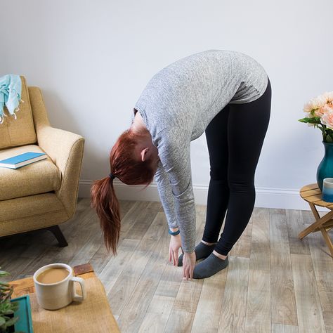 LittleThings.com : 5. Standing Toe Touch : Trapped Gas: 10 Stretches That Can Help You Pass Wind Quickly -- Stand with your feet placed firmly on the floor. Bending at the hips, reach your hands toward your toes. If you can't reach the floor, lean forward as far as you can, and balance your hands on a piece of furniture if you need to. Health explains that this pose can strengthen your spine and back muscles, which will relieve tension in your back and neck. If your gas pain is affecting your... How To Relieve Gas, Gas Relief Remedies, Painful Gas, Sickness Remedies, Gas Remedies, Getting Rid Of Gas, Stomach Gas, Yoga Goals, Trapped Gas