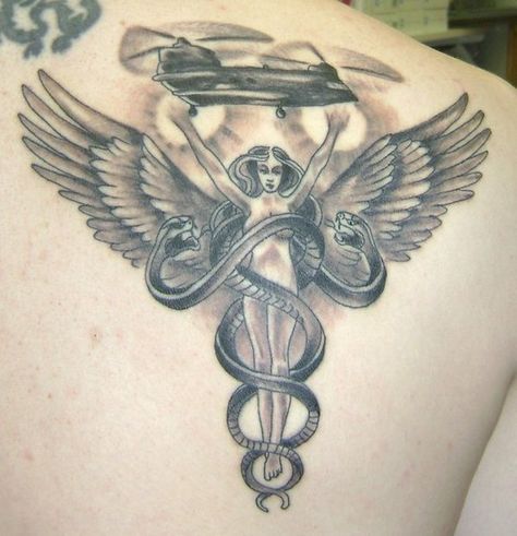 I'm really thinking about getting this one now. Life Flight Nurse Caduceus Tattoo Flight Tattoo, Caduceus Tattoo, Angel Nurse, Nurse Angel, Nurse Symbol, Flight Nurse, Nurse Tattoo, Health Symbol, Symbol Tattoo