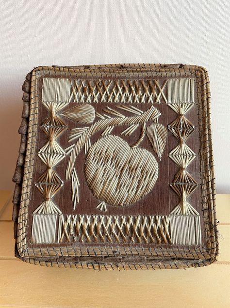 Vintage, collectible porcupine quill and birch box lined in cloth. Cover/lid of box features a piece of fruit on a vine (perhaps Guava?) along with geometric and lattice patterns. Edges (of perhaps straw or sweet grass) are neatly stitched. There is some minor damage with the small, brittle pieces of quill having broken. Please visit our shop on Etsy for more photos and more information. Age and further history unknown. Size: 5 3/4 inches by 5 1/4 inches by 2 1/8 inches Birch Box, Quill Art, Quill Work, Porcupine Quills, Information Age, Bark Box, Lattice Pattern, Birch Bark, Quilling Designs