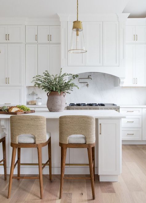 Love this classic kitchen design with white floor-to-ceiling cabinets, glass & brass pendant lights, and seagrass counter stools. kitchen decor - kitchen lighting - kitchen furniture - kitchen cabinet ideas White Stone Backsplash, Classic Kitchen Design, Beautiful Kitchen Designs, Kitchen Counter Stools, White Oak Floors, Classic Kitchens, Transitional Kitchen, Living Room Remodel, White Kitchen Cabinets