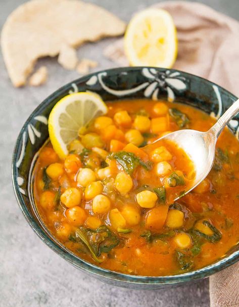 This warming and hearty chickpea soup comes together in less than 30 minutes. Plus, it tastes delicious and is made with cheap store cupboard staples and spinach from the freezer. Bonus? A portion comes out at less than $ 1.50! #veganrecipes #chickpearecipes #souprecipes #cheapmeals #vegandinners #healthydinnerrecipes #souprecipeshealthy Mediterranean Soup, Chickpea And Spinach, Soup Recipe Ideas, Spinach Soup Recipe, Salad Appetizer Cups, Quick Soup Recipes, Mediterranean Chickpea, Appetizer Cups, Tomato Cucumber Salad