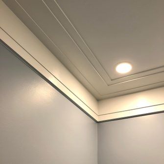 8 Modern Crown Molding Designs and Ideas | The Family Handyman Crown Molding In Modern Home, Crown Molding French, Thick Crown Molding Ideas, Modern Crown Molding Ideas Ceiling, Crown Molding In Bathroom, Modern Trim Ideas, Crown Molding Lighting, Craftsman Crown Molding, Ceiling Trim Ideas