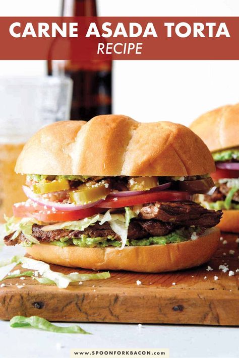 The only Carne Asada Torta recipe you'll ever need! The savory and juicy carne asada is loaded into a soft roll and piled high with all the classic Mexican flavors and toppings! #torta #sandwich #mexican #recipe Carne Asada Burger, Beef Tortas Mexican, Carne Asada Sandwich, Mexican Tortas Sandwich Recipes, Tortas Mexicanas Recipe Steak, Easy Tortas Mexicanas Recipe, Tortas Mexicanas Recipe Beef, Tortas Mexicanas Recipe Carne Asada, Steak Torta