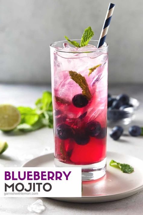 Bring on summer! Blueberry Mojitos are filled with rum, blueberry, lime, and mint and are a refreshing twist on the classic mojito everyone loves. These gorgeous drinks scream summer and can be made in less than 10 minutes. Best Rum For Mojitos, Blueberry Mojito Recipe, Blueberry Simple Syrup, Batch Cocktail Recipe, Classic Mojito, Blueberry Vodka, Blueberry Mojito, Good Rum, Seasonal Drinks