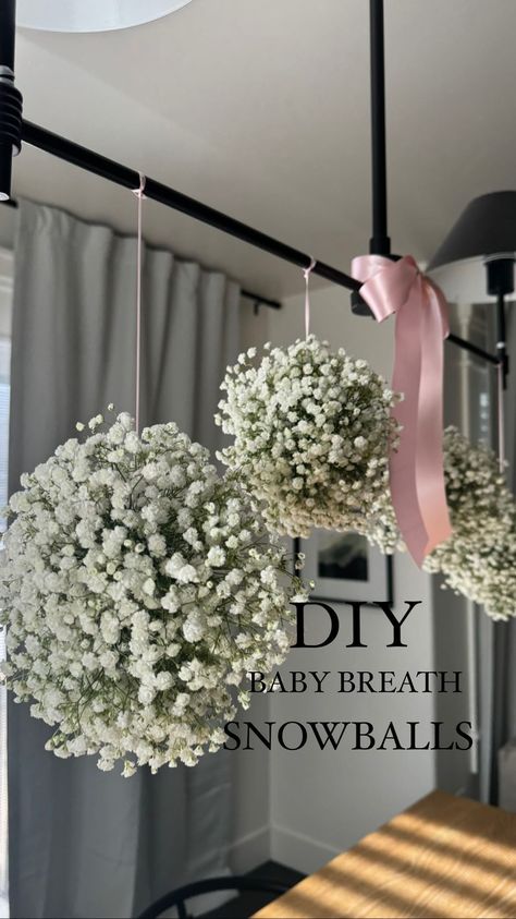 Tiffany Dalling | In my DIY era. Sharing how I made these baby breath snowballs for the cutest baby shower. Couldn’t be happier how they turned out. 💗 | Instagram January Baby Shower Themes, Baby Shower Clothesline, January Baby Shower, Topiary Diy, Winter Baby Shower Themes, January Baby, Garden Baby Showers, Baby Breath, Ireland Wedding