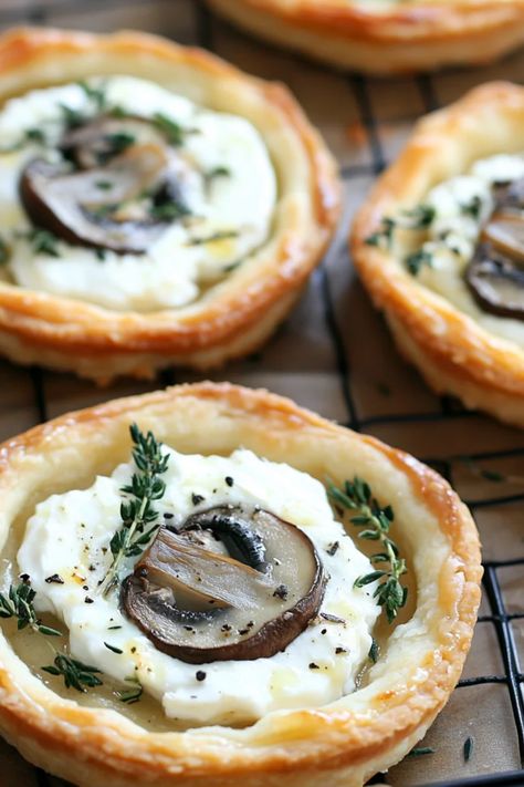 Delicious spicy goat cheese tarts ready for serving. This recipe combines creamy goat cheese with a kick for the perfect appetizer. Mushroom Shallot, Goat Cheese Tarts, Herbed Goat Cheese, Brunch Appetizers, Creamy Goat Cheese, Goat Cheese Tart, Caramelized Shallots, Tarts Recipe, Elegant Appetizers