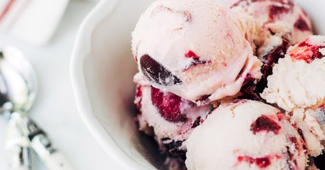 Rich and creamy with chunks of fresh rum-soaked Bing cherries swirled throughout a custard base, this Rum Cherry Ice Cream is a grown-up twist on a classic. Black Cherry Ice Cream, Cherry Ice Cream Recipe, Blackberry Cheesecake, Almond Ice Cream, Cherry Ice Cream, Cheesecake Ice Cream, Roasted Cherry, Ice Cream Ingredients, Ice Cream Popsicles